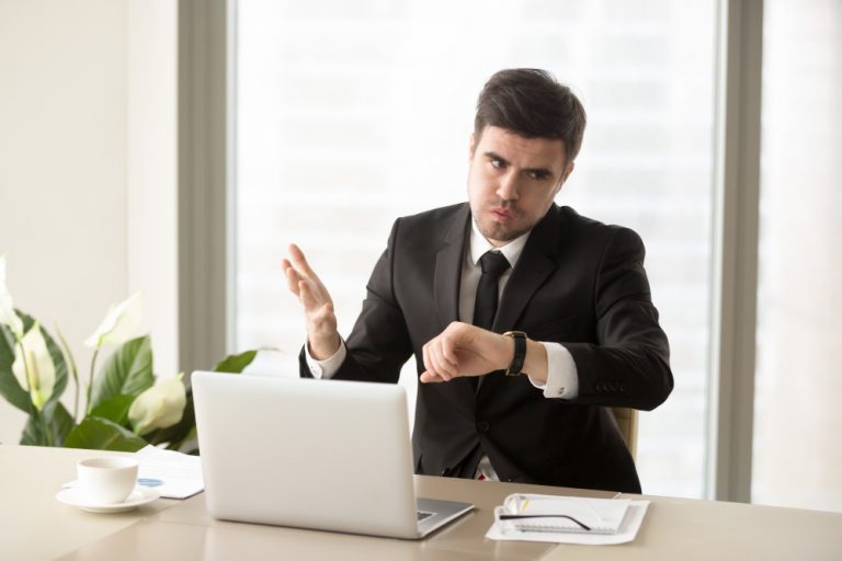 Employee looking at wrist watch